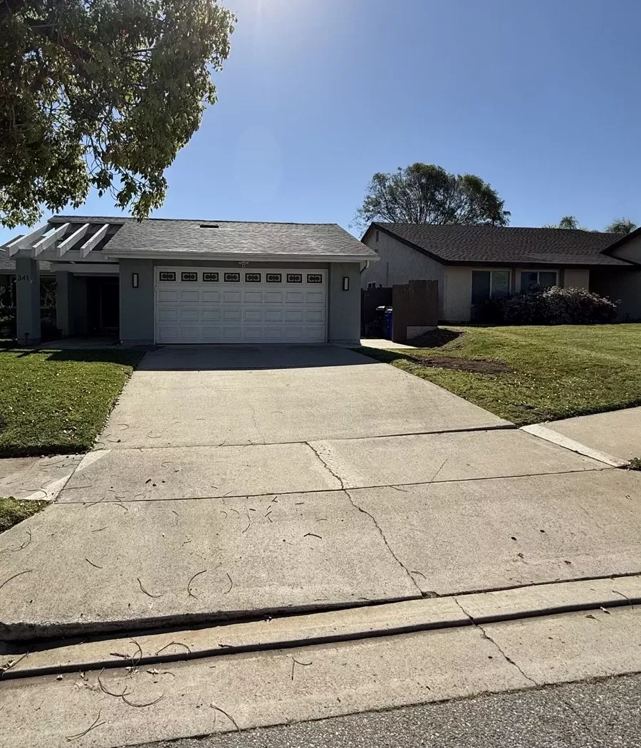San Marcos home before driveway and entry-step transformation