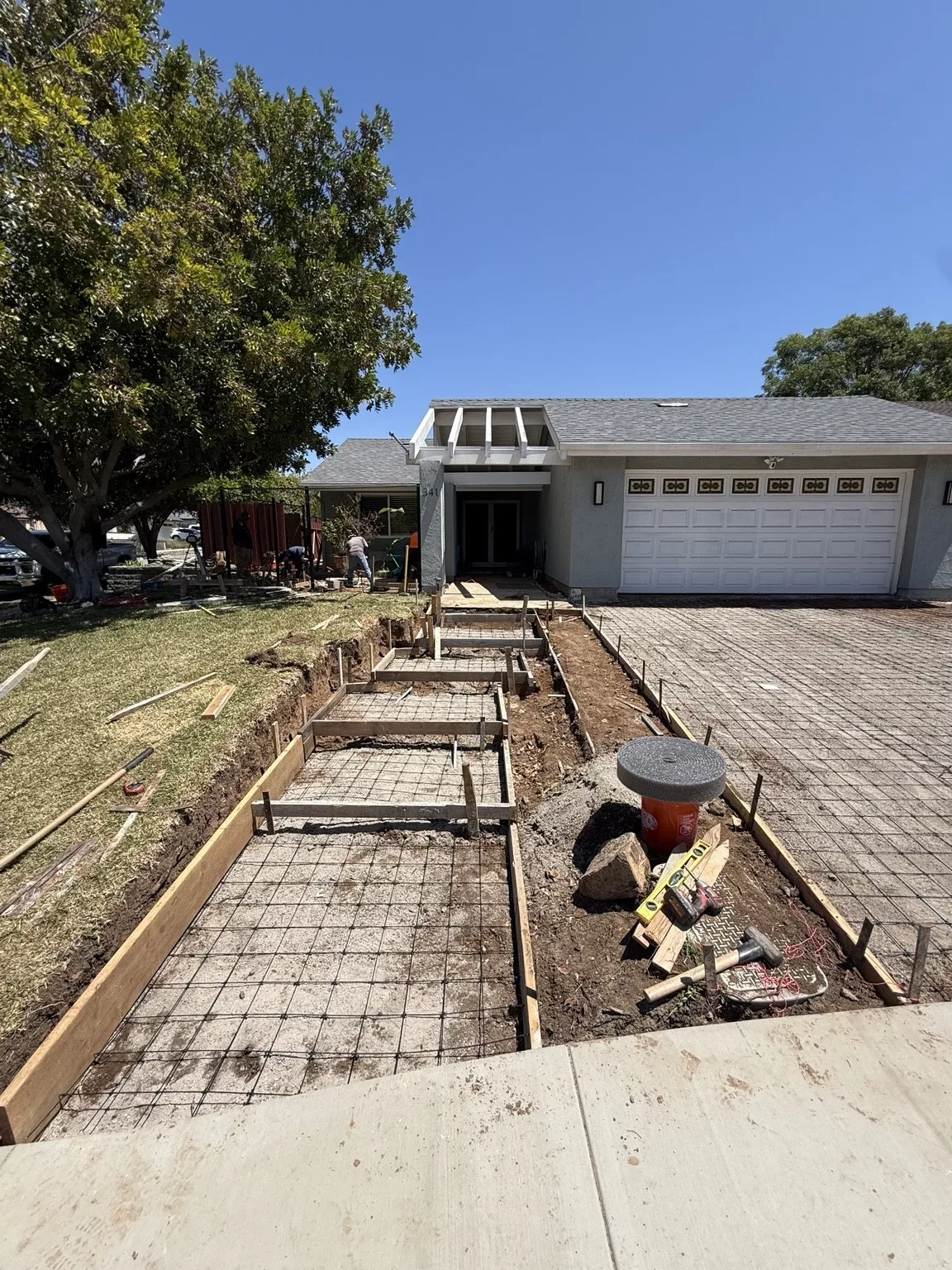 Site preparation with formed entry-step structure before finish materials were installed in San Marcos, CA
