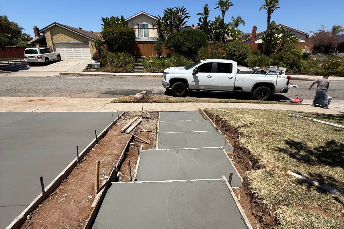 Poured concrete driveway and walkway with control joints, San Marcos