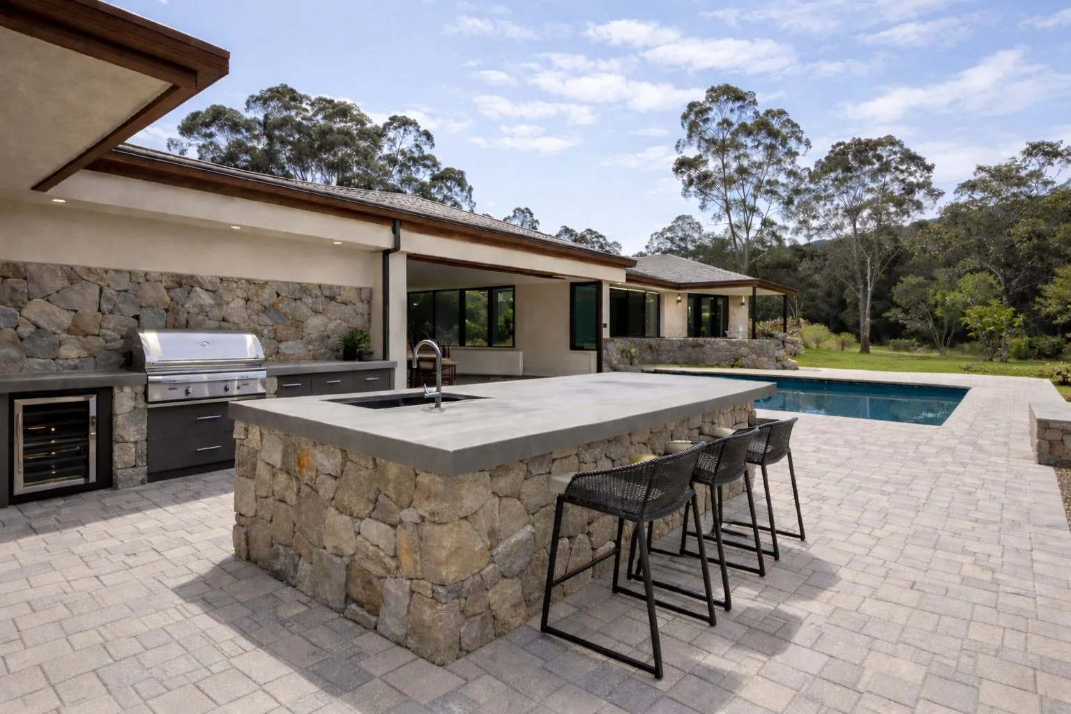 Outdoor kitchen and patio living area