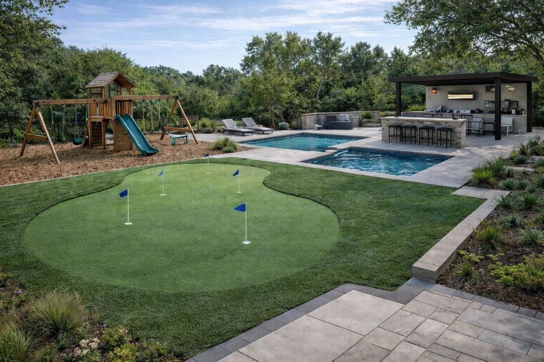 Backyard putting green and surrounding landscape