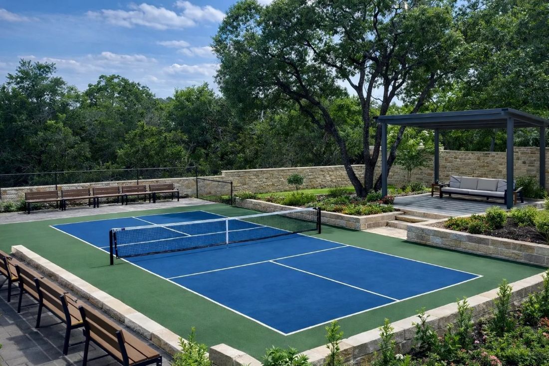 Backyard putting green and surrounding landscape